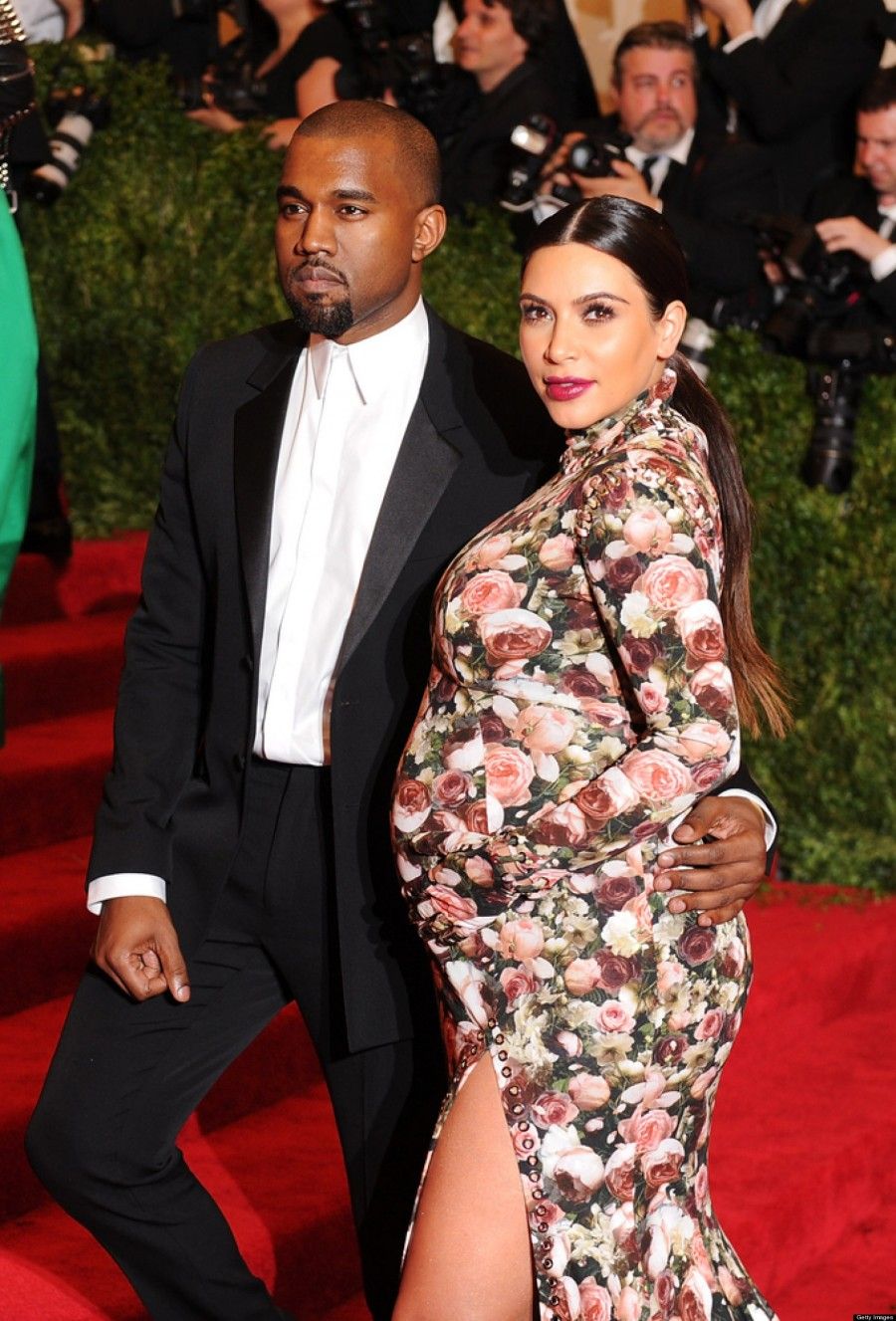 NEW YORK, NY - MAY 06: Kanye West and Kim Kardashian attend the Costume Institute Gala for the "PUNK: Chaos to Couture" exhibition at the Metropolitan Museum of Art on May 6, 2013 in New York City. (Photo by Dimitrios Kambouris/Getty Images)