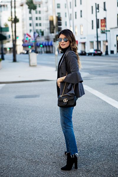 Giacca con volant, jeans e stivaletti - The Girl from Panama
