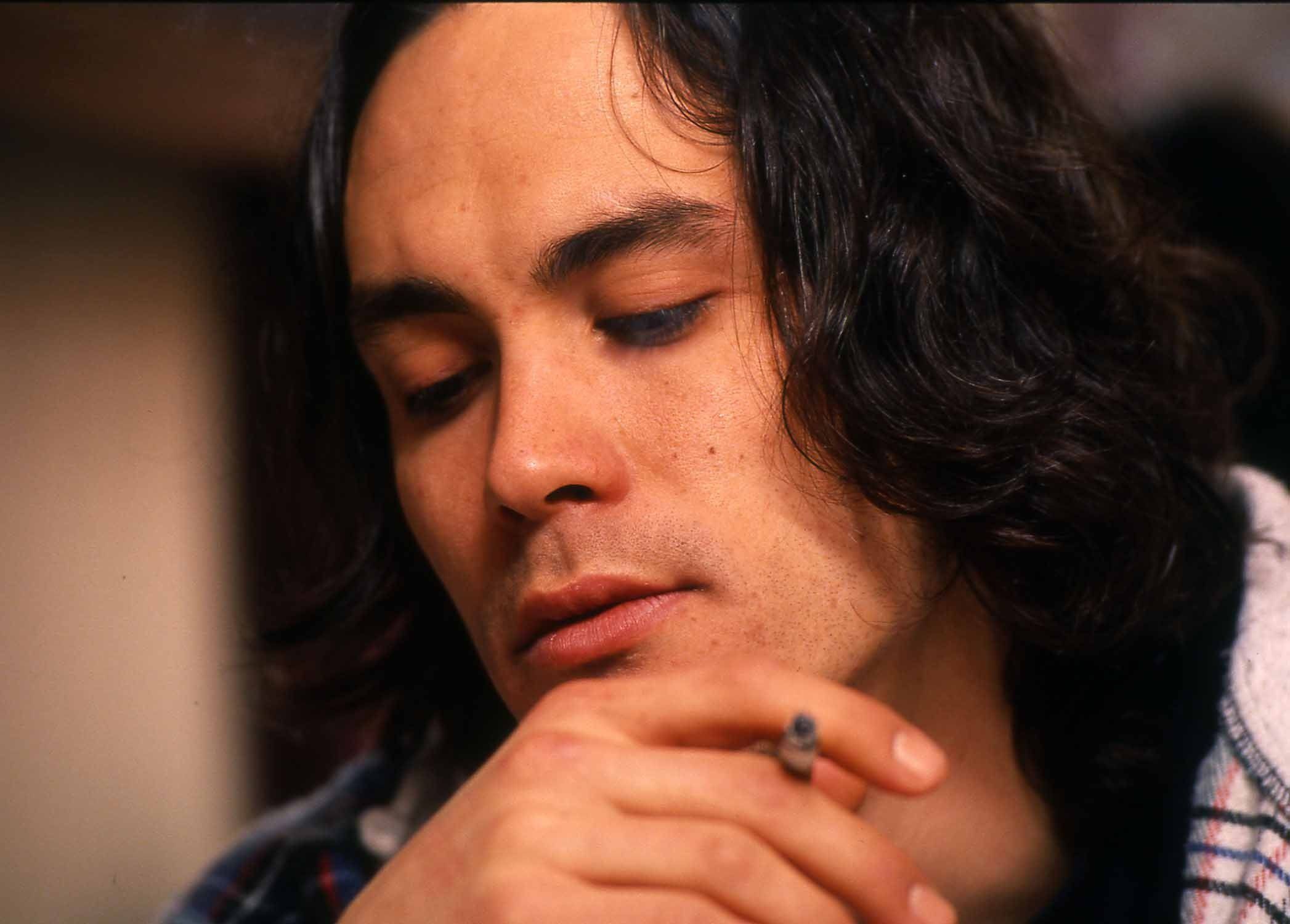 Actor Brandon Lee chain smokes cigarettes in his trailer during a late-night interview on March 23, 1993, the week before he died on the set of The Crow in Wilmington N.C. - Photo by Jamie Moncrief / Wilmington Star-News