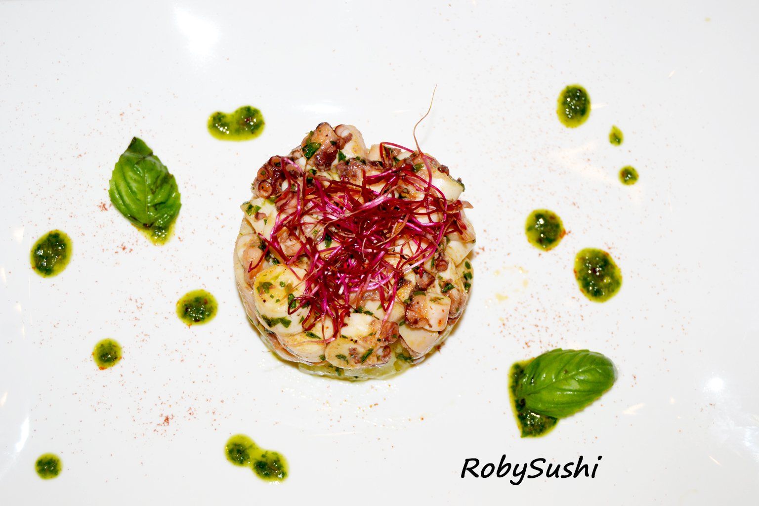 Polpo alla paprika con pesto di rucola e pistacchi di Bronte