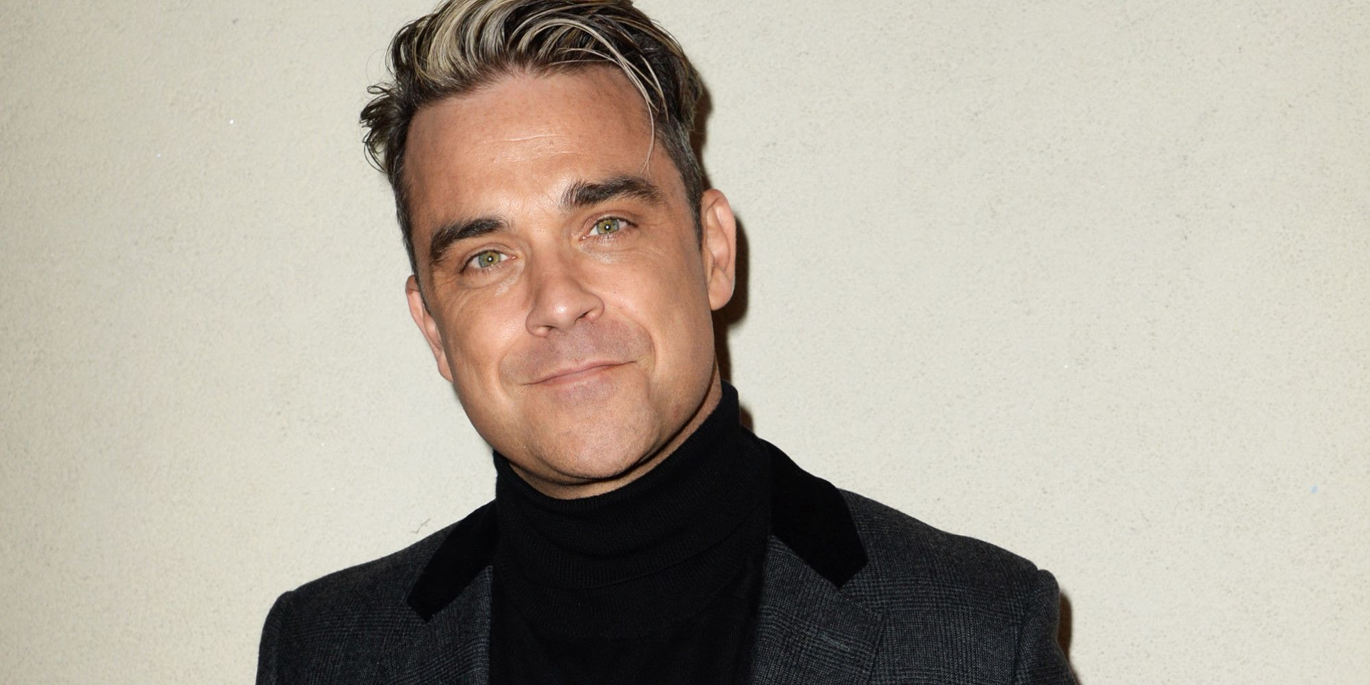 Robbie Williams: la moglie partorisce con ai piedi un paio di Louboutin