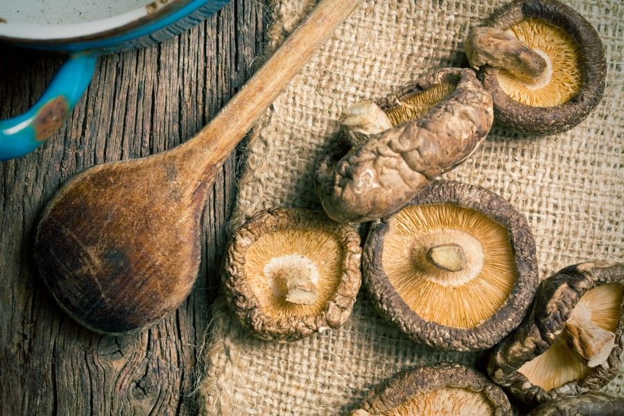 top view of dried shiitake mushrooms on table