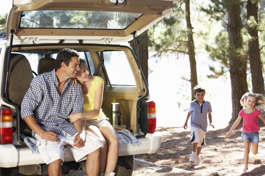 Young family on day out in country