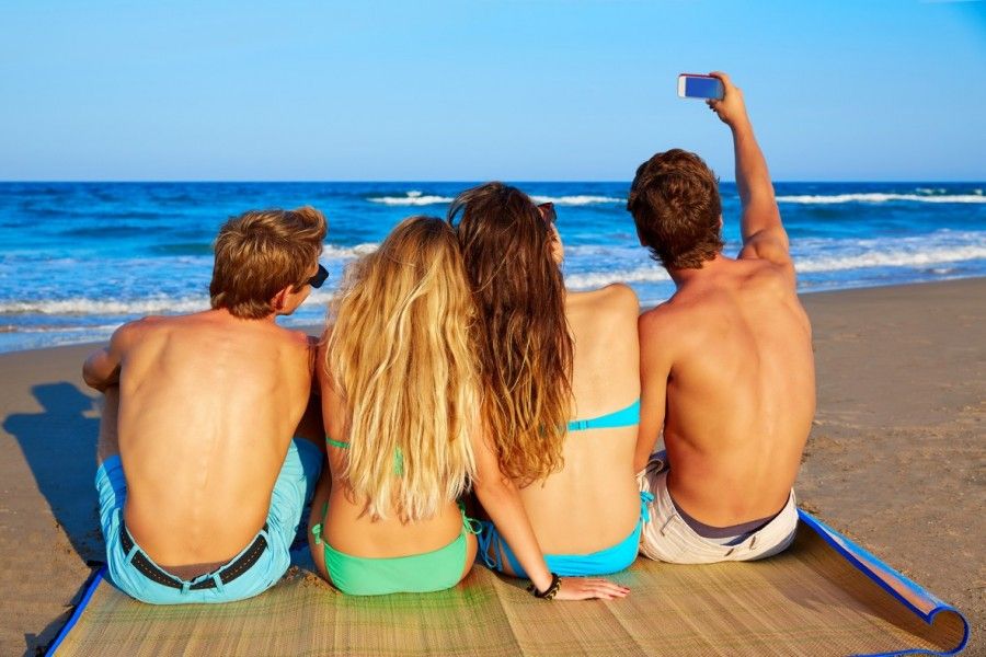 bigstock-friends-group-selfie-photo-sit-95394308-e1436794926440