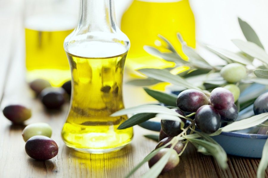 olive oil on wooden table