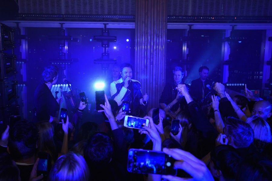 NEW YORK, NY - SEPTEMBER 13:  Duran Duran performs onstage at the new Gold Collection fragrance launch hosted by Michael Kors featuring Duran Duran at Top of The Standard Hotel on September 13, 2015 in New York City.  (Photo by Larry Busacca/Getty Images for Michael Kors)