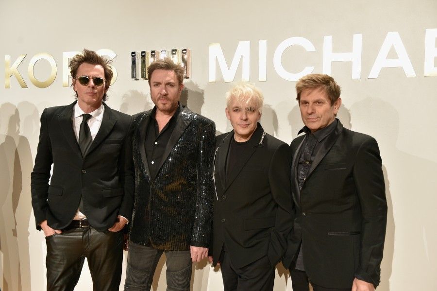 NEW YORK, NY - SEPTEMBER 13:  Members of Duran Duran John Taylor, Simon Le Bon, Nick Rhodes Roger Taylor attend  the new Gold Collection fragrance launch hosted by Michael Kors featuring Duran Duran at Top of The Standard Hotel on September 13, 2015 in New York City.  (Photo by Larry Busacca/Getty Images for Michael Kors)