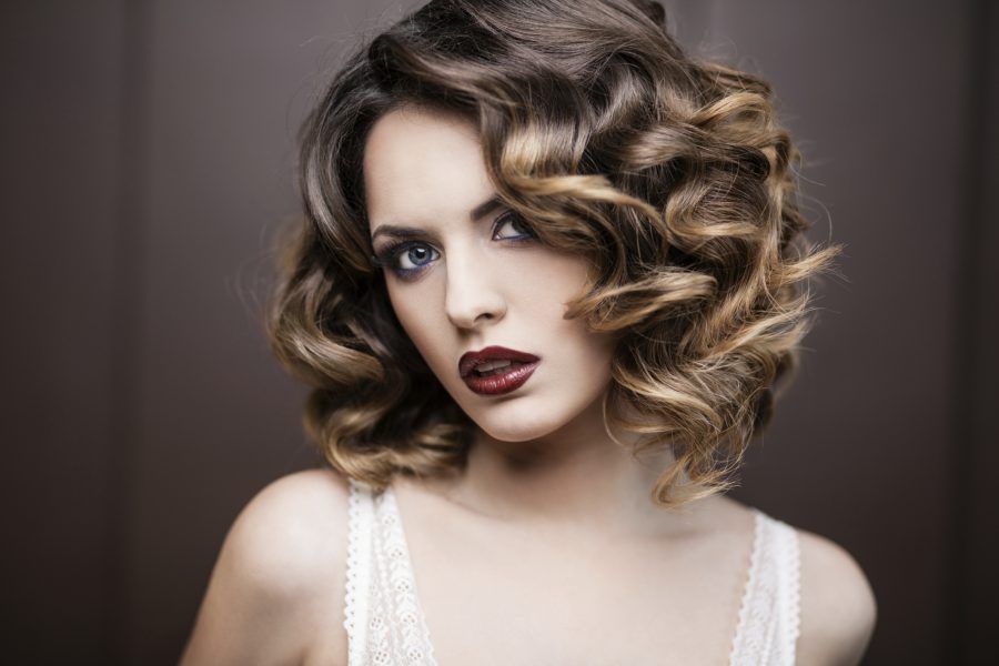 Beauty styled closeup portrait of a young woman