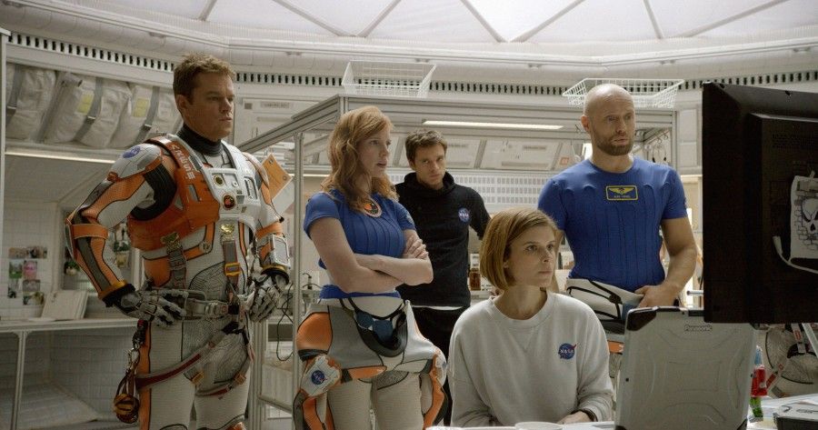 (from left) Matt Damon, Jessica Chastain, Sebastian Stan, Kate Mara, and Aksel Hennie portray the crewmembers of the fateful mission to Mars.