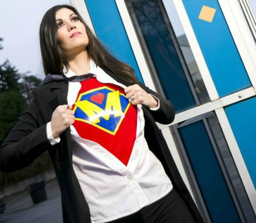 Super Megan the Super Mother comes out of the phone booth to fight fear.