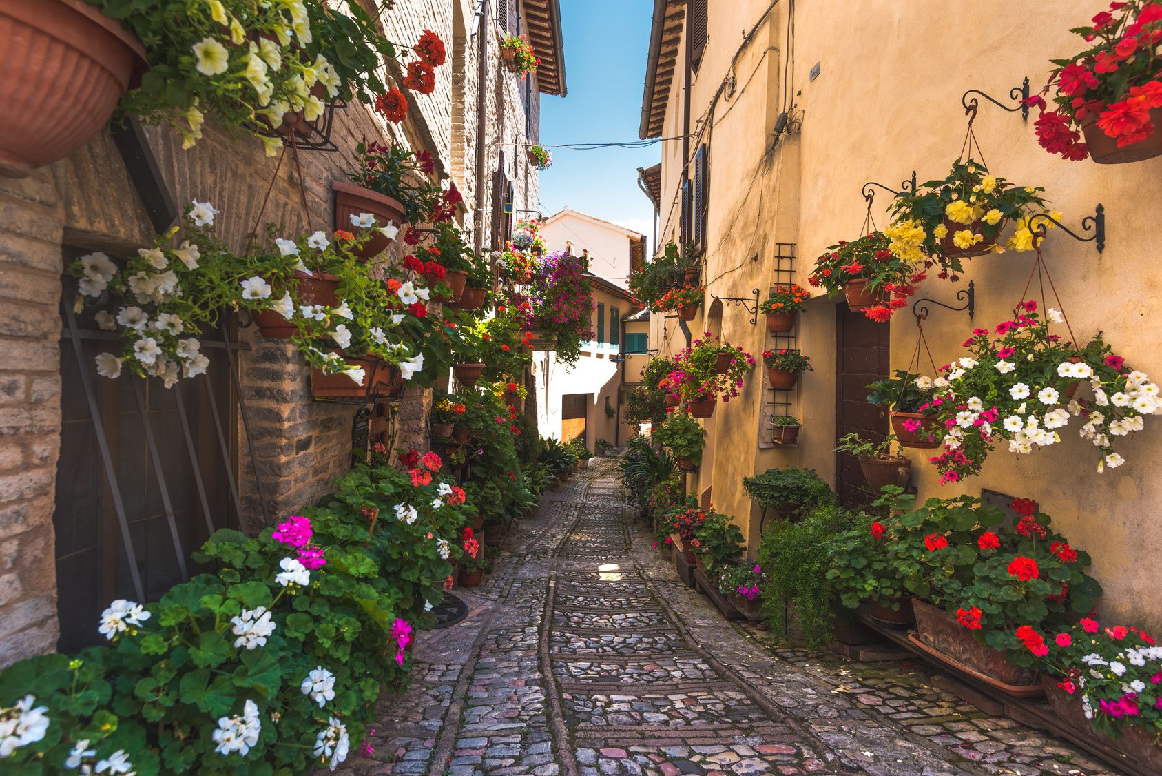 Floral street in central Italy, in the small Umbrian medieval town, Italy