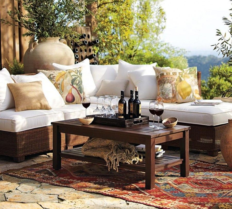 Stunning-White-Sectional-Sofa-of-Rustic-Outdoor-Furniture-Facing-Wicker-Base-and-Wooden-Table