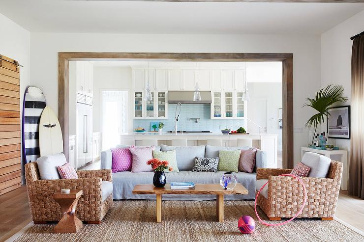 beach-living-room-gray-slipcovered-sofa-live-edge-coffee-table