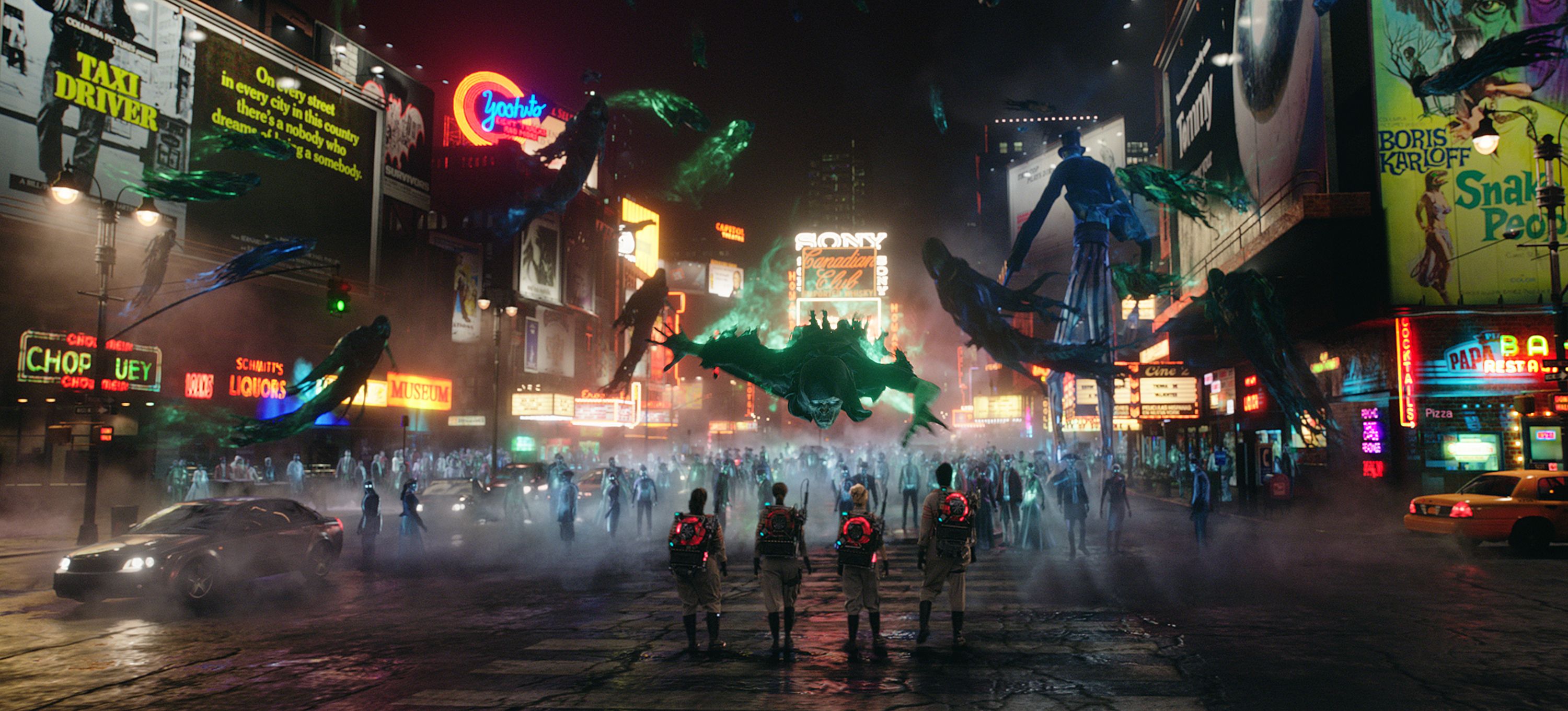 Ghostbusters Abby (Melissa McCarthy), Erin (Kristen Wiig), Holtzmann (Kate McKinnon) and Patty (Leslie Jones) surrounded by ghosts in Times Squares in New York in Columbia Pictures' GHOSTBUSTERS.