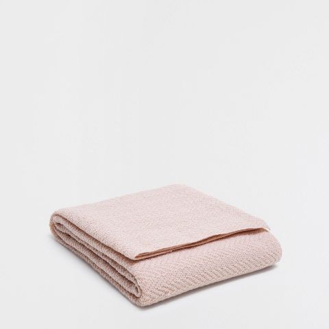 COPERTA IN MAGLIA ZIGZAG ROSA - prezzo 35,99 euro