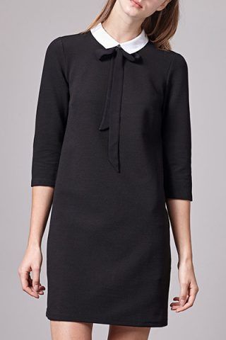 Vestito nero con colletto bianco di Stradivarius (25,95 €)