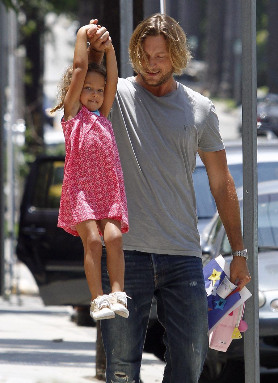 #7573189 Gabriel Aubry, ex of actress Halle Berry, was all smiles as he pick up his daughter Nahla on July 8, 2011 from a local recreational center in Los Angeles, California. Nahla looked to be having a blast using her fathers arm for amusement as they walked to the car. Aubry and Berry are currently battling over a violation in the custody agreement the two have made when Halles lawyer submitted document to the courts saying the model put their daughter at risk. The court date was set back after Aubry failed to appear on June 28, 2011. Fame Pictures, Inc - Santa Monica, CA, USA - +1 (310) 395-0500