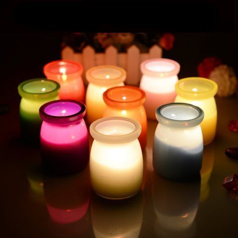 Candele in vasetti