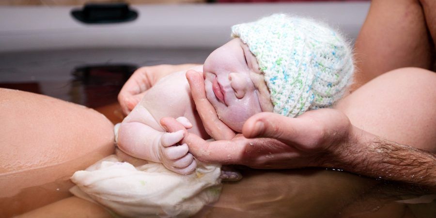 Brand new baby born via natural home water birth