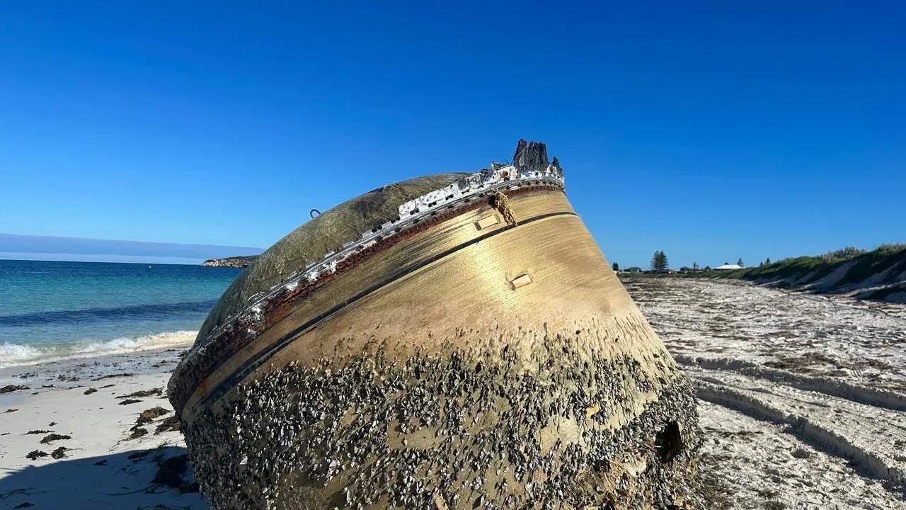 oggetto cilindrico spiaggia Australia